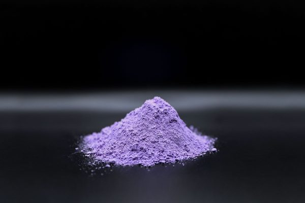 purple colored rock climbing chalk